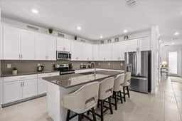 6 Bedrooms / 5 Bathrooms / Champions Gate (8939TW)