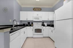 4 Bedrooms/ 3 Bathrooms Lucaya Village (9-104)